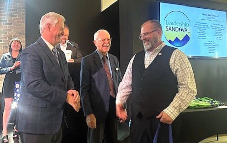 Sandoval County Commission Chair, David J. Heil (C), and County Manager Wayne Johnson (L) heartily
congratulate Jeff Stow (RJ, Assistant Director of IT Services at Sandoval County, for completing
the 2024 Leadership Sandoval Program.