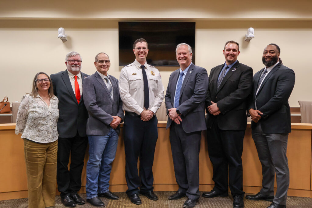 Commissioner Katherine A. Bruch, District 1, Commissioner Jon Herr, District 2, Chair Michael Meek, District 3, Sandoval County Fire and Rescue Chief Eric Masterson, Sandoval County Manager Wayne A. Johnson, Vice Chair Jordan Juarez, District 4, Commissioner Joshua A. Jones