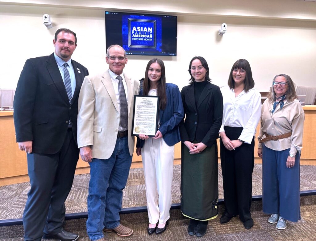 Alana Carrick and Sulamit Shin (third and fourth from left), co-presidents of the Cottonwood Classical Preparatory School Asian and Pacific Islanders Student Union, and faculty adviser, Francine Binnert, with Commissioners (from left) Jordan Juarez, Michael Meek, and Katherine Bruch.