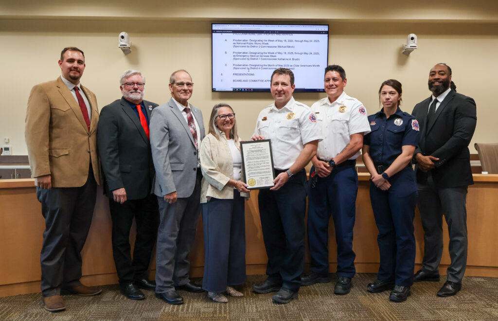 Sandoval County Fire Department & Emergency Medical Services with Interim Fire Chief Chris Bagley, Lawrence Gutierrez, Battalion Chief, and Amanda Campos, Firefighter/EMT, with Commissioners (from left) Jordan Juarez, Jon Herr, Michael Meek, Katherine A. Bruch, and Joshua Jones.
