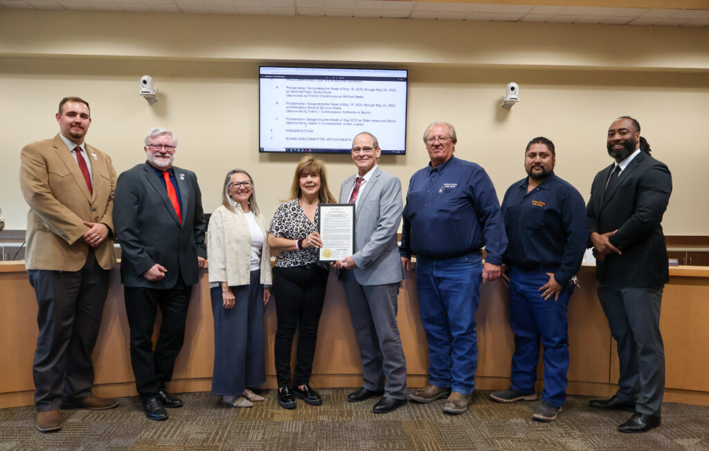 Sandoval County Public Works employees with Public Works Director Mark Hatzenbuhler (third from right), Rosanne Gomez, Assistant Director, and Juan Martinez, Vehicle and Equipment Maintenance Manager, with Commissioners (from left) Jordan Juarez, Jon Herr, District 2, Katherine A. Bruch, Michael Meek, and Joshua Jones, District 2.
