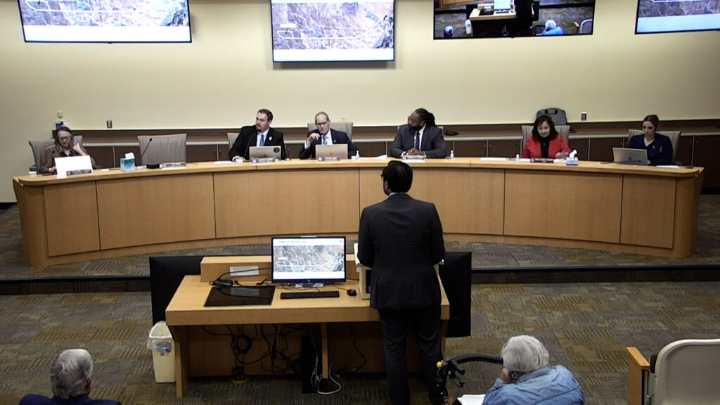 Kreitz presenting to Sandoval County Commissioners on October 22, 2025