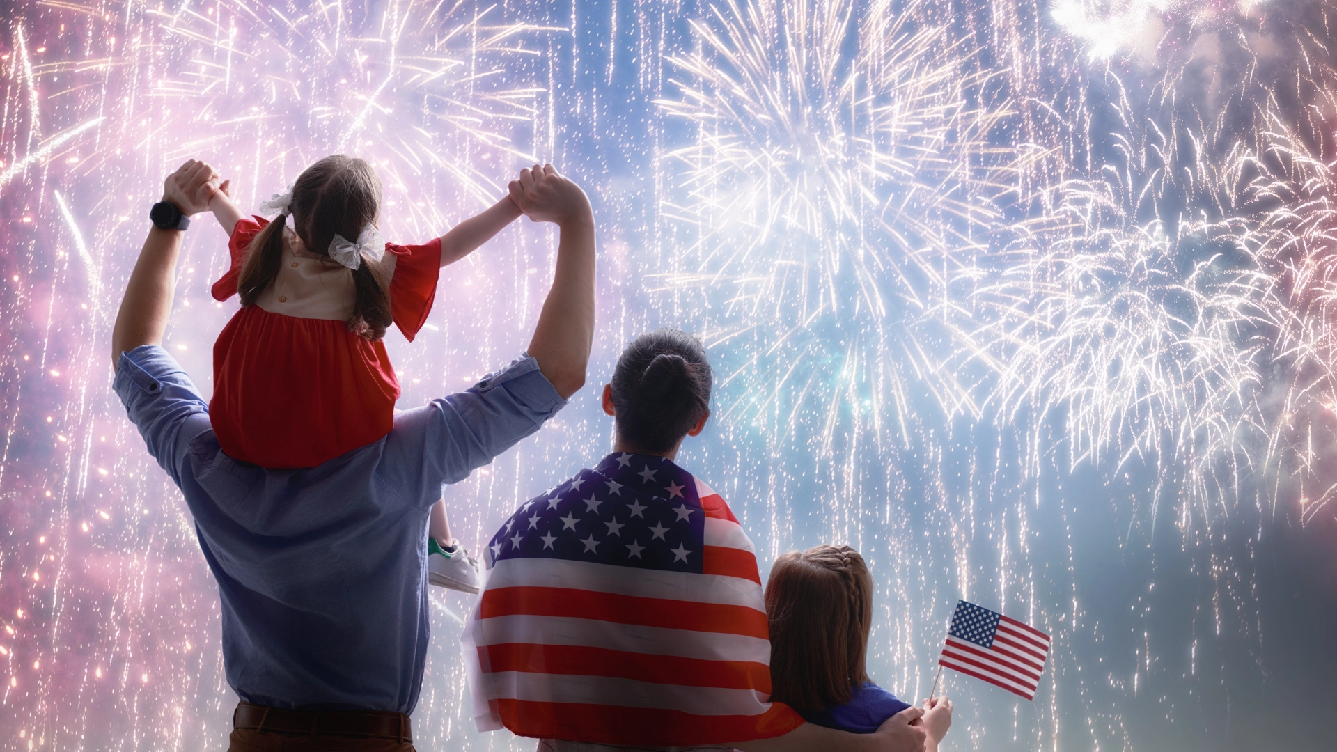 family watching fireworks