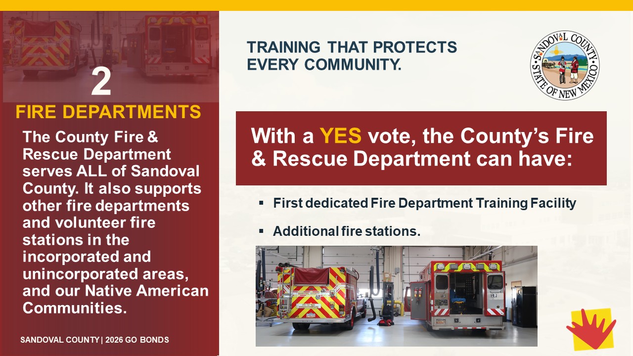 Presentation slide titled "2 FIRE DEPARTMENTS" discussing how a "YES" vote on Sandoval County 2026 GO Bonds will support the County Fire & Rescue Department by enabling a dedicated training facility and additional fire stations, with images of fire engines and an ambulance.